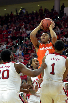 Ron Patterson goes up for a layup as N.C. State's Trevor Lacey tries to take a charge.