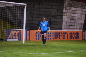 Courtney Brosnan suffered an injury during the game, but still made six saves and kept SU competitive.
