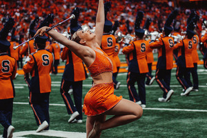 Trina Catterson grew up in Queens and picked up twirling at four-years-old. She eventually competed at the World Championships and is now Syracuse's 25th Orange Girl. 