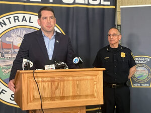 Mayor Ben Walsh (left) and Police Chief Joe Cecile (right) speak at a Tuesday press conference about Nefertiti Harris, a 5-year-old who police believe was killed by her mother, Latasha Mott.