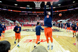 Trevor Cooney rises for a layup during warmups at PNC Arena.