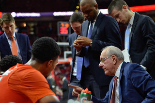 Head coach Jim Boeheim speaks to his team during a stoppage of play. It was announced yesterday that Boeheim would be suspended for the first nine conference games next year.