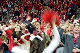 The Wolfpack's student section cheers on N.C. State, which earned a first-round bye in the ACC tournament with a win against SU.