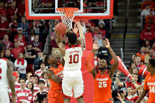 Roberson and Christmas defend against Wolfpack forward Lennard Freeman. The N.C. State sophomore had six points on the afternoon.