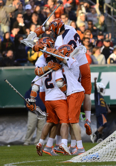 Syracuse forms a quasi-fun bunch in celebration.