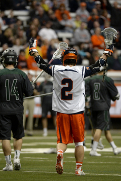 Rice raises his hands in celebration. Syracuse pulled out a 10-8 win for its second straight victory. 