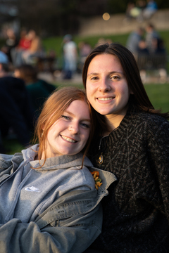 A portrait of Mackenzie Koniszewski and Larisa Mulholland, ESF students relaxing on the quad.