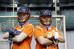 Kelsey Richard (left) and Alyssa Costantino (right) split time in net for the Orange. Unlike most elite programs, the platoon works for No. 1 SU.