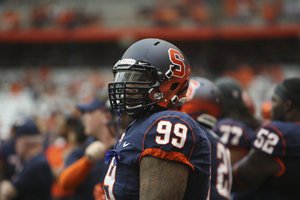 Ryan Sloan wears SU's new helmet, made by Nike. The Orange players had input in designing the helmets.