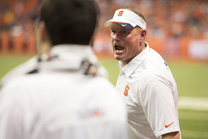 Syracuse head coach Scott Shafer shouts at an official after what he believed was a missed penalty call.