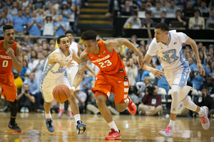 Malachi Richardson runs in front of two UNC defenders. His passive play was one of the three things we learned on Monday night.