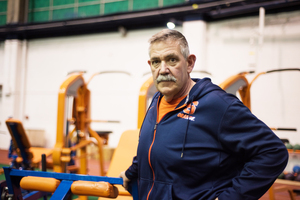 Will Hicks is still bringing joy and working hand in hand with Syracuse athletes. Just instead of football players, it's the softball and tennis players. 