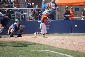 Sammy Fernandez used to bat righty, now she slaps lefty to get a head start to first base. 