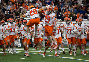 David Lipka leads Syracuse's handshake line in an effort to hype his teammates up pregame.