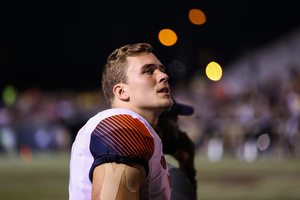 Eric Dungey's rushing prowess kept the Orange ahead in its 55-42 season-opening win.