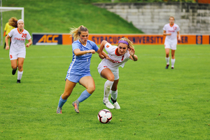 Kate Hostage struggles for position with a North Carolina player.