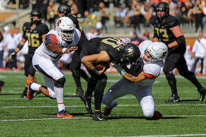 Syracuse's defense put pressure on the quarterback all afternoon and forced three turnovers on Saturday at Wake Forest.