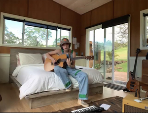 King Princess performed a half-hour virtual concert from her bedroom, using an acoustic guitar and electric keyboard.