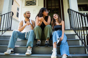 The Mudpit co-owners Guiv Lederer, Emma Barbosa and Camille Rowlands-Rees banter on the front steps of the house where the music venue is located. “We all enjoy this so much that I will always make the time for this and I will always want to have a conversation with the two of them about everything that we’re doing,” Rowlands-Rees said.
