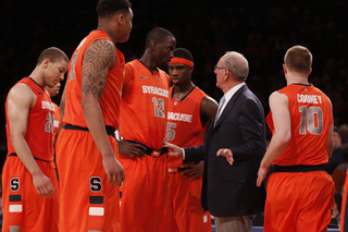 Jim Boeheim talks to Baye Moussa Keita during a timeout. The senior center scored 12 points in 24 minutes Saturday.