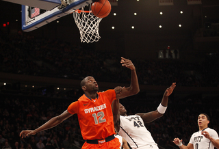 Baye Moussa Keita battles for a rebound.