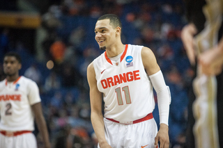 Ennis cracks a smile during the Orange's 24-point victory Thursday.