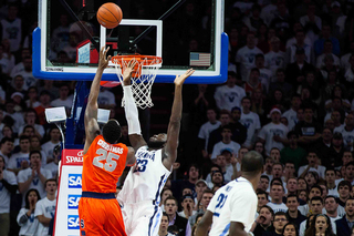 Rakeem Christmas puts up a left-handed hook shot over Daniel Ochefu. Christmas had foul trouble early, but returned to his effective self late in the first half. 