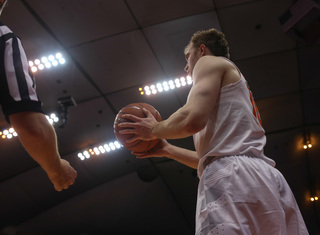 Cooney tries to inbound a pass. Cooney finished with 14 points on the night.