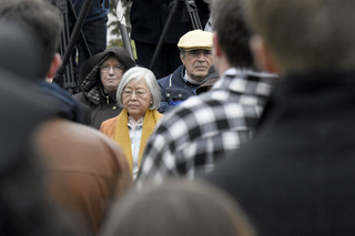 Ruth Chen, professor of practice at the College of Engineering and Computer Science, watches the ceremony. 