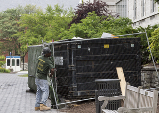 A giant garbage container houses the waste from the process to upgrade classrooms in the Hall of Languages. Photo taken by July 11, 2017