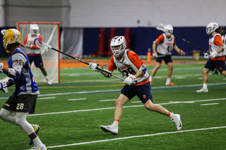 The Orange try to stop Hofstra's attack.