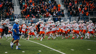 Syracuse's bench empties onto the field. 