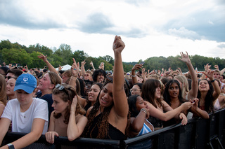 Music from the artists at the 2022 Juice Jam travels down the road from the Skytop Field lot Sunday afternoon. Even the rain couldn’t stop students from gathering together to enjoy the show.  