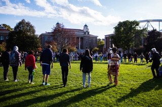 As the dances winded down, Haudenosaunee Singers and Dancers founder Sherri Waterman-Hopper asked the crowd to perform a Round Dance. The vast majority of the crowd joined in, forming a large circle on SU’s quad.